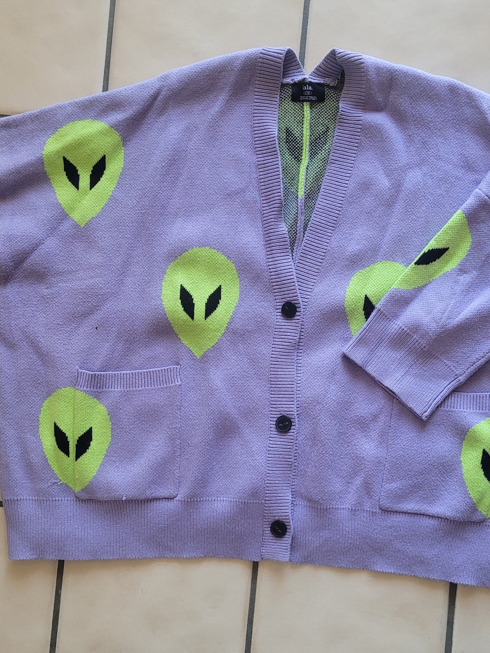 Dressed in LALA Lavender Cardigan with Neon Green Alien Motif